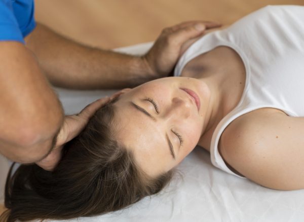 osteopathy-patient-getting-treatment-massage